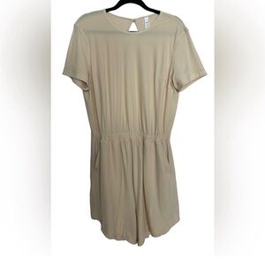 Lululemon Lightweight High-Neck Romper in
Prosecco Sz. 10